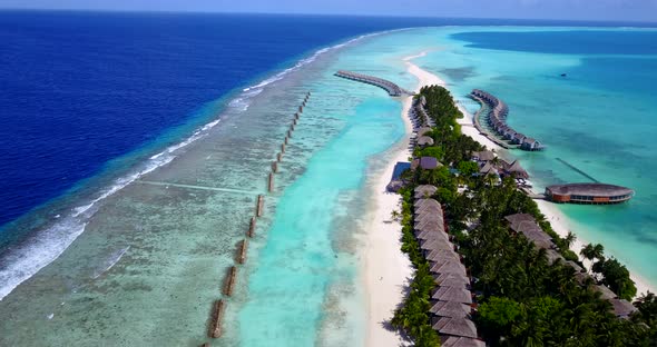 Beautiful aerial copy space shot of a paradise sunny white sand beach and turquoise sea background i