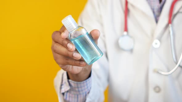 Close Up of Doctor Hand Using Sanitizer Gel