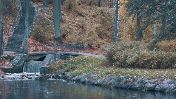 City Park Arkadijas With Bridge and Waterfall in Riga, Latvia, District Agenskalsns.