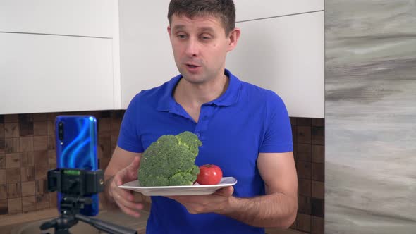 A Food Blogger Shoots a Video About Vegetables on a Smartphone