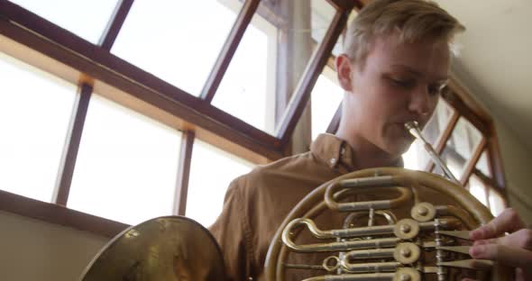 Teenage musicians rehearsing