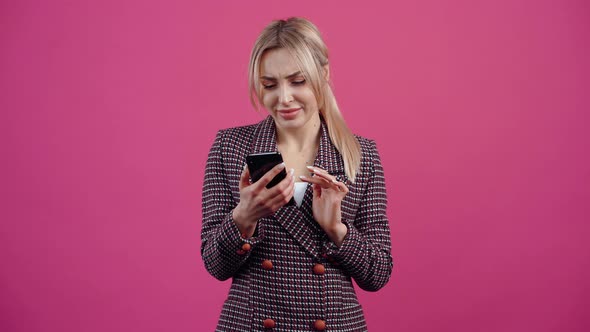 The Dissatisfied Young Woman Reads a Conversation with Ugly Messages Points Her Finger Down in