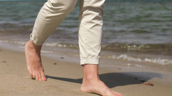 Woman Feet Walking Barefoot Along Summer Beach 10
