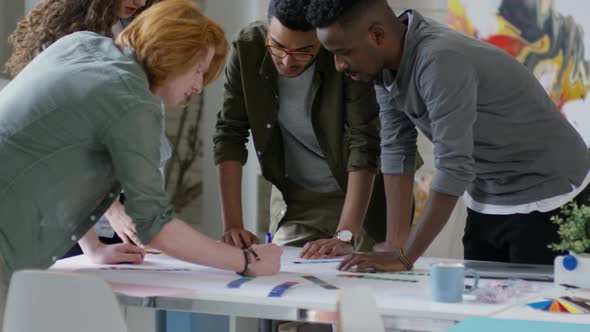 Young Creative Professionals Drawing Project Flowchart