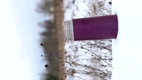 Vertical Video Small Thermos with Steaming Hot Drink