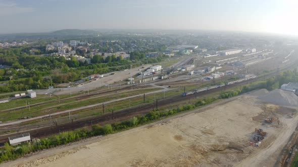 Aerial view. Modern high speed train. Railroad in landscape, aerial view from above. 