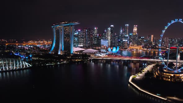 Hyperlapse time-lapse of Singapore cityscape view at Marina Bay at night. Singapore city landmark
