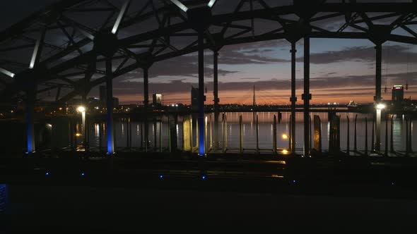 Cargo Train Going Over the Bridge During Epic Sunset in Riga Latvia