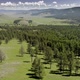 Green Meadows in The Sparsely Wooded Between Forest Covered Hills with Aerial View - VideoHive Item for Sale