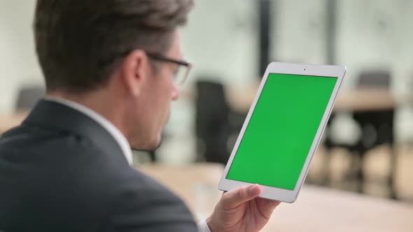 Businessman Using Tablet with Chroma Screen