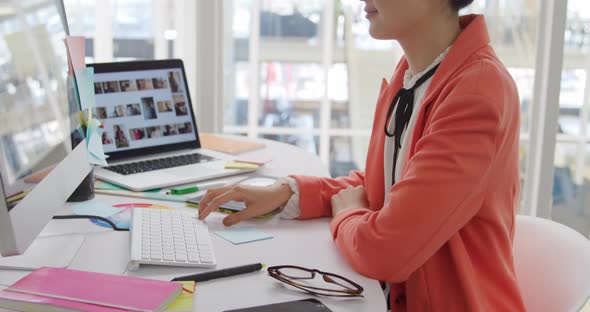 Young woman working in a creative office