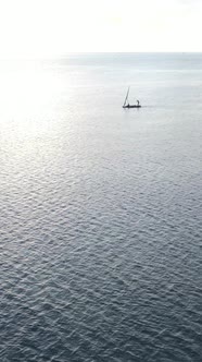 Vertical Video Boats in the Ocean Near the Coast of Zanzibar Tanzania