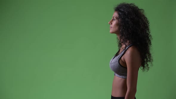 Profile View of Young Beautiful Hispanic Woman Thinking Ready for Gym