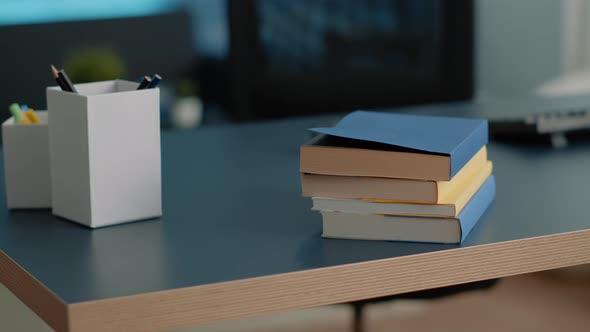 Close Up of Desk with School Books for Education and Studying