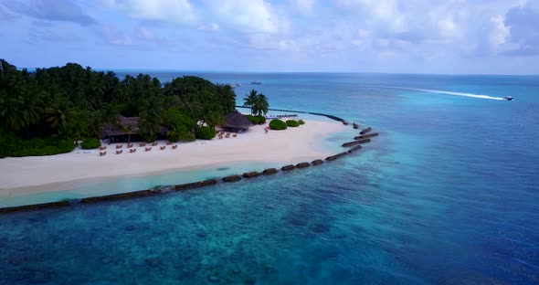 Tropical above tourism shot of a summer white paradise sand beach and blue ocean background in best 