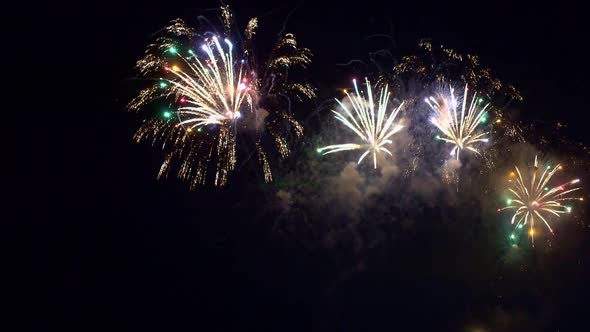 Colorful Firework display at night on sky background
