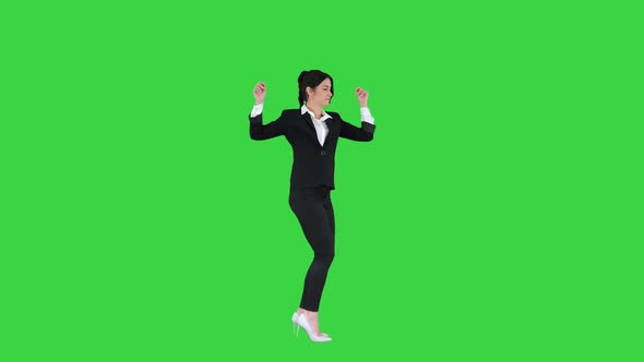 Businesswoman Dancing on a Green Screen, Chroma Key.