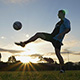 Soccer (Football) Player Juggles a Ball at Sunset - VideoHive Item for Sale