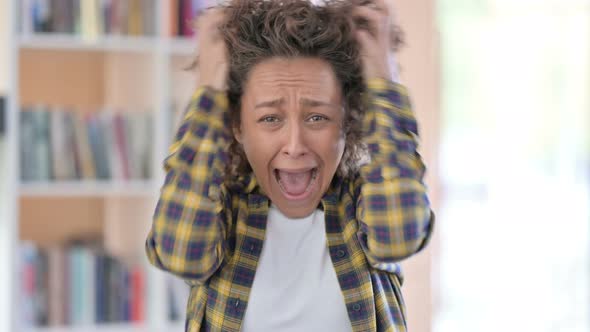 Portrait of Annoyed Mixed Race Woman Shouting