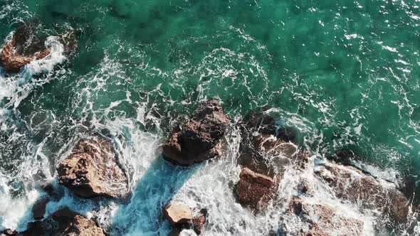 Big Ocean Waves Splashing Against Rocks and Cliffs