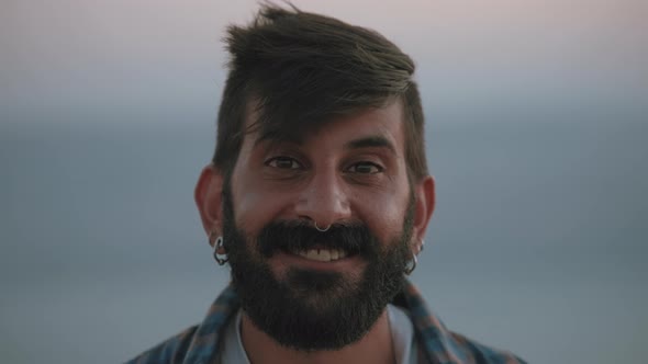 Close up of a smiling middle eastern man