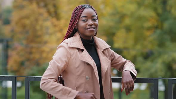 Headshot Portrait African American Young Woman Model Having Long Hairs Turns Slowly Confidently