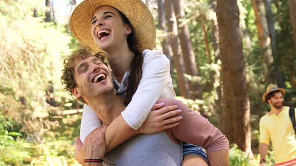 Man carrying Woman