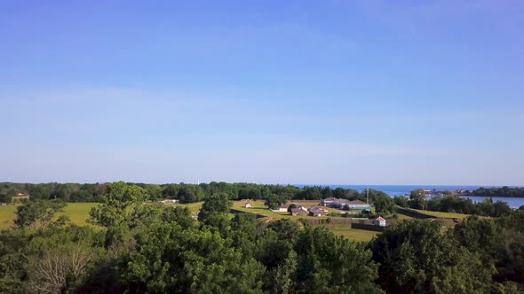 Aerial rise over a scenic countryside.