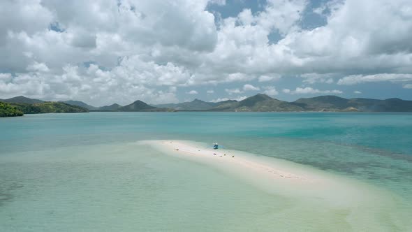 Aerial Drone  Tourist Banca Boat Moored at Sandbar During Low Tide