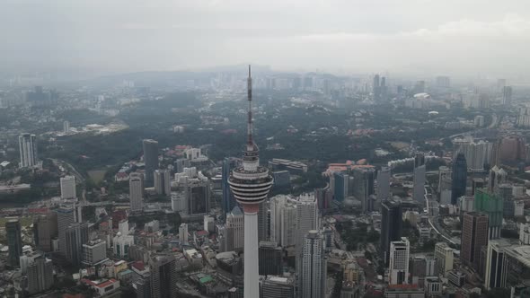 Aerial view of telecommunication building and city of Kuala Lumpur