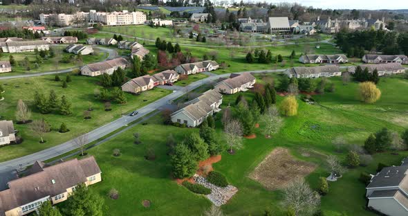 Large sprawling retirement home community campus. Senior citizen population and private living quart