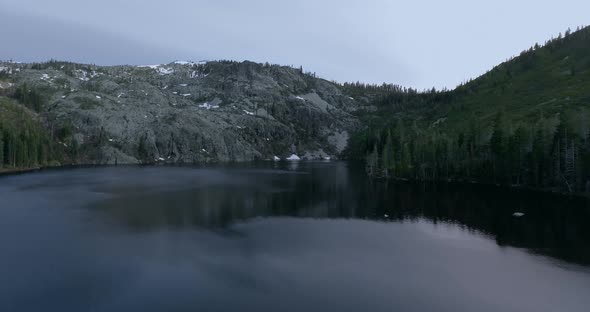 Drone video of Casle Lake rocky shore, Shasta-Trinity Forest, California