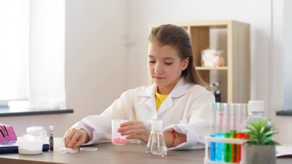 Girl with Powder Making Slime at Home Laboratory