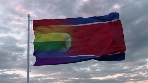 Waving Flag of North Korea State and LGBT Rainbow Flag Background