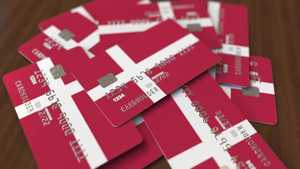Pile of Credit Cards with Flag of Denmark