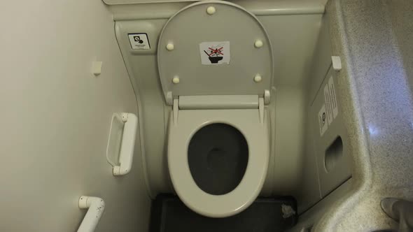 Public Toilet in the Airplane Airplane Bathroom