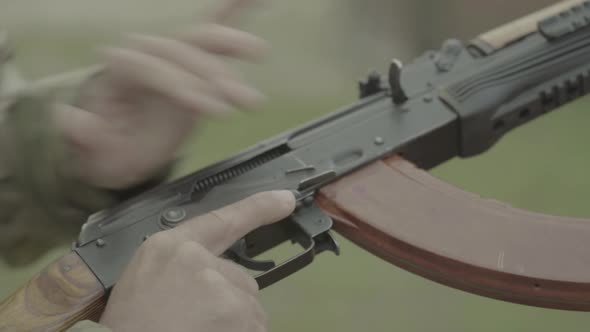 Rifle Shooter During Shooting. Close-up