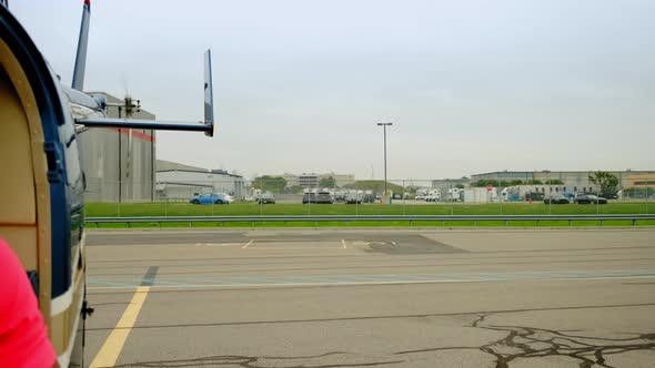 Aerial View From Taking Off Helicopter Camera Inside alt