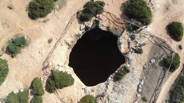 Algar De Benagil secret Cave, outside hole - Rocket reveal Aerial shot