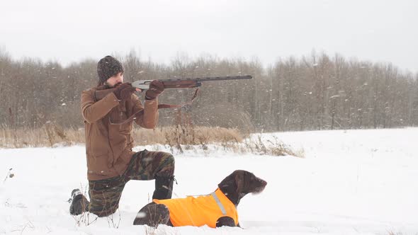 Young Man Pointed His Weapon at the Bird