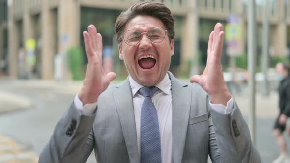 Screaming Middle Aged Businessman, Outdoor