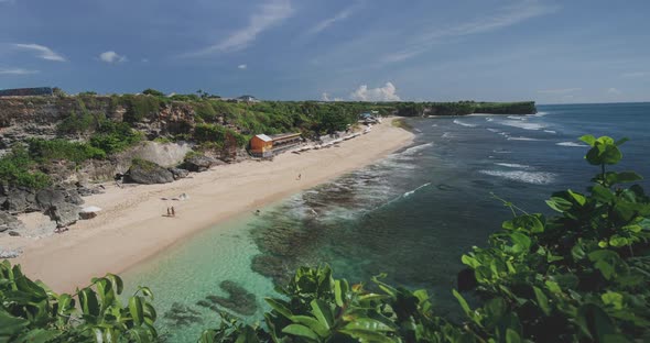 Timelapse Aerial Bali Beach Coast at Ocean Waves Crashing to Sand