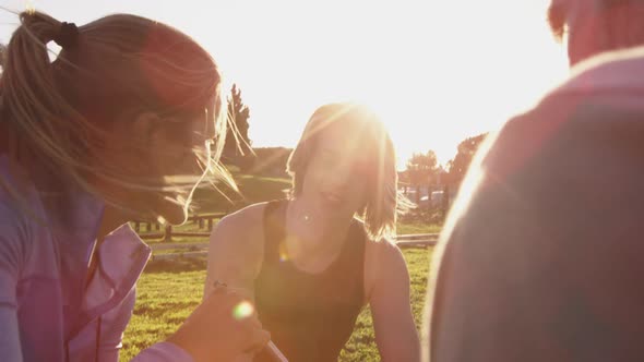 Young adults training at an outdoor gym bootcamp