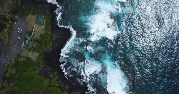 The Big Island of Hawai'i housing beautiful contrasts of black, green and blue, all shown from above