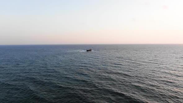 Cargo Ship Sailing in a Clear Ocean