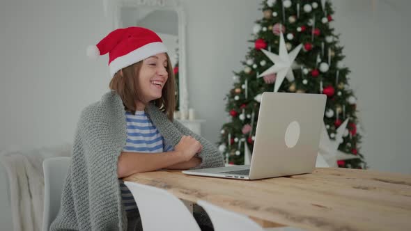 Woman use laptop at Christmas