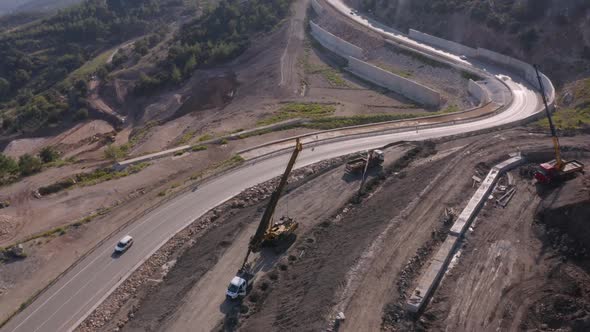 Aerial Drone View of Heavy Machinery at Mountains Quarry