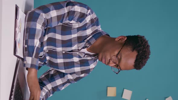 Vertical Video Desperate Employee Working on Laptop Computer at Desk