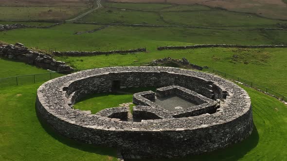 Loher Ringfort, Kerry, Ireland, March 2022. Drone orbits the ancient monument at a low altitude from