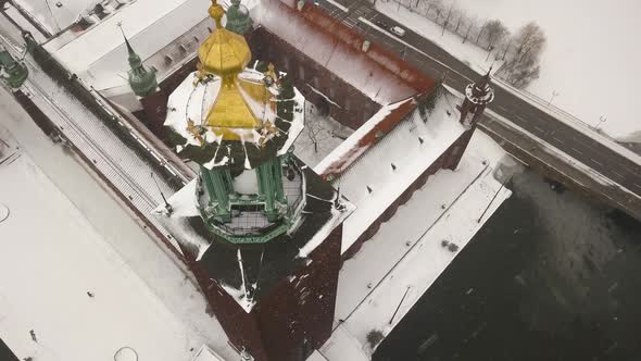 Smooth rolling pan and tilt aerial footage over Stockholm's City Hall's famous tower.